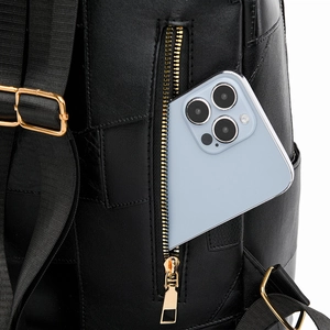 Detail showing back zipper pocket of black faux leather backpack with mobile phone