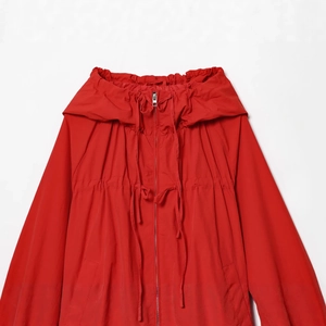 Fashionable red hooded nylon jacket for women with drawstring waist and zipper closure