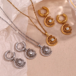 Vintage 18K gold and silver celestial evil eye pendant necklace and earring jewelry set