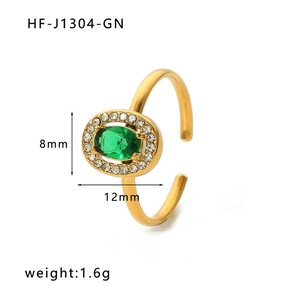 Detailed view of adjustable golden ring with green oval gemstone and zircon halo accents