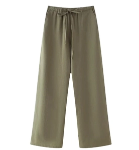 Detailed view of women olive green wide leg trousers with high waist drawstring and linen texture