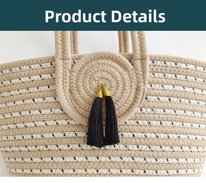 Detail of woven straw tote featuring white cotton rope texture and black tassel charms