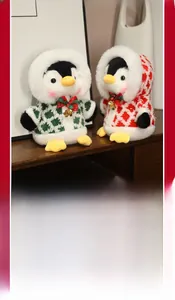 Detail of cute Christmas penguin plush toys with plaid hoodies and tiny gold bells