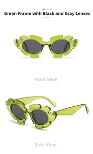 Detail view of flower-shaped green sunglasses with dark grey lenses and side temple