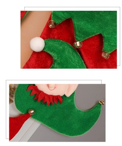 Detail of Christmas elf stockings with festive red and green felt and gold bells