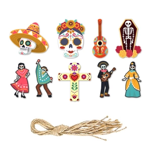 Set of 9 Day of the Dead paper ornaments with skull designs and jute twine on white background