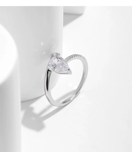 Detailed view of s925 silver ring featuring teardrop cubic zirconia and pavé diamonds