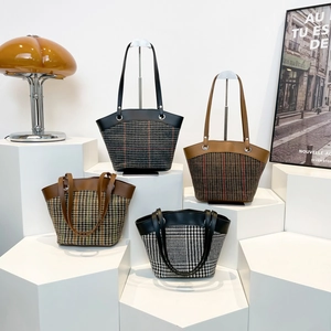 Contrast striped tote bags in plaid fabric with faux leather trim and long shoulder straps
