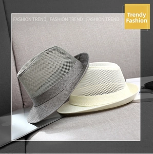 Breathable mesh straw hats in grey and beige colors showing ventilated weave pattern