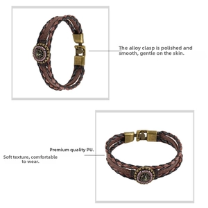 Detail of multi-layer woven leather bracelet with polished alloy clasp and vintage ornaments