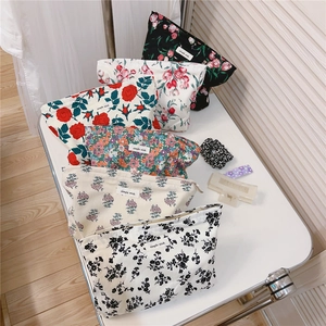 Set of assorted vintage floral cotton cosmetic bags featuring various flower patterns