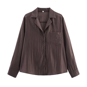 Brown long sleeve button-down shirt with embroidered pocket and notched collar