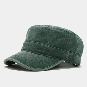 Close-up of washed cotton cadet cap showing vintage texture and reinforced brim stitching