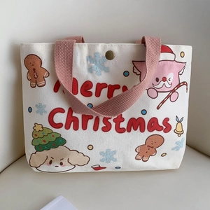 Christmas themed white canvas handbag with pink handles and cartoon gingerbread print