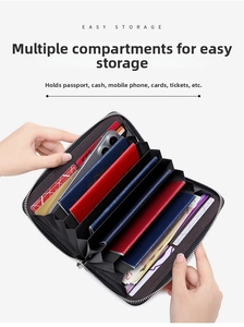 Detail view of leather wallet interior with multiple slots for passport and phone