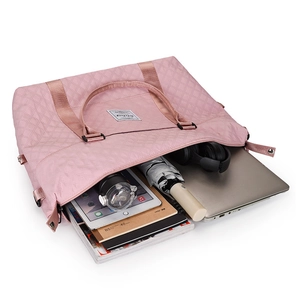 Pink quilted large yoga tote bag showing interior storage for laptop and essentials