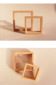 Detail showing two orange PE film jewelry display boxes in different sizes for earrings