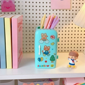 Detail of mint green fridge pen holder with cute stickers and macaron pens inside