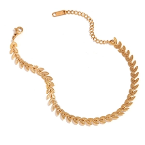 Minimalist 18K gold plated stainless steel leaf chain bracelet with lobster clasp on white