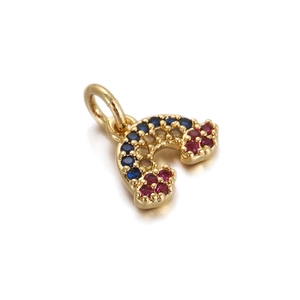 Detailed close-up of 18K gold-plated rainbow pendant with colorful inset gemstones
