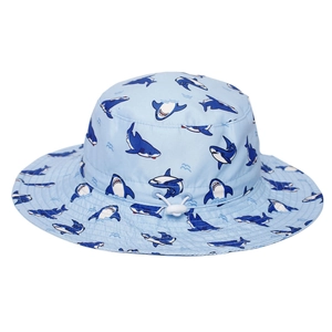 Detail of shark print sun hat with adjustable white chin strap for children