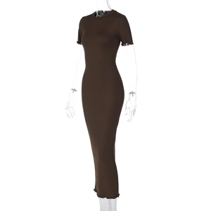 Detail of coffee brown ribbed knit fabric on a slim fit long-sleeved dress