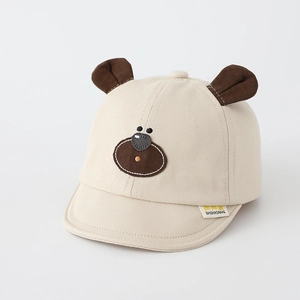 Detail of baby bear baseball cap showing 3D ears and cute embroidered bear face