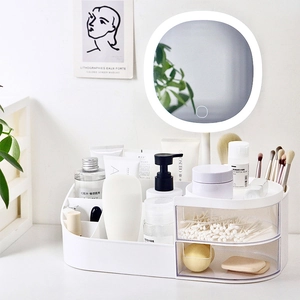 White cosmetic organizer with LED lighted mirror, compartments and clear drawers