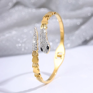 18k gold plated stainless steel snake bangle with pave crystals and black eyes