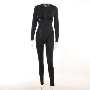Detail view of the front zipper closure and contour stitching on this black bodysuit