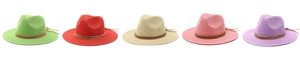 Detail showing five colorful straw panama hats with brown studded belts in a row
