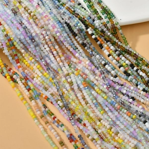 Close-up of 3mm colorful faceted crystal spacer beads for DIY jewelry making