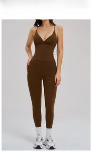 Detail of dark brown high-waist yoga leggings and V-neck sports camisole on female model