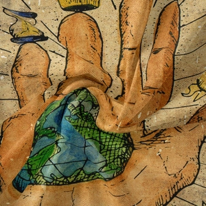 Detail of bohemian tapestry fabric showing hand holding earth with vintage texture
