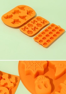 Close-up of orange silicone Halloween molds featuring pumpkin and ghost shapes for baking