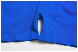 Detailed macro shot of royal blue seamless high-waist yoga shorts with knit texture