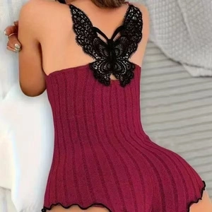 Burgundy ribbed knit bodysuit with large black lace butterfly appliqué on the back detail