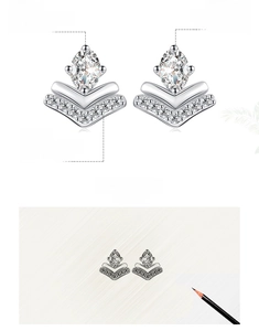 Macro detail of V-shaped S925 sterling silver stud earring with marquise zircon stones