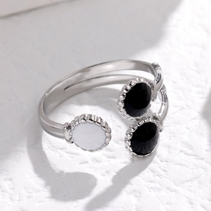 Minimalist adjustable silver stainless steel open ring with black and white enamel dots