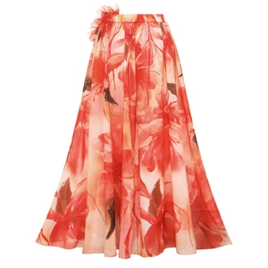 Detailed view of high-waisted chiffon maxi skirt with vibrant red floral print and 3D flower