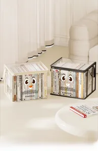 Transparent book storage bins with reinforced handles and minimalist text design