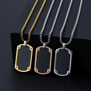 Three men's military tag necklaces in gold, rose gold and silver with carbon fiber inlays