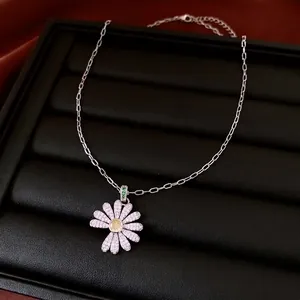 Luxury daisy pendant necklace with sparkling diamond petals on elegant silver chain