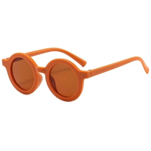 Detail of retro round orange sunglasses for kids with UV400 mocha lenses and matte finish