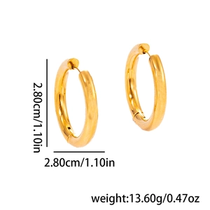 Detailed size view of golden twisted hoop earrings showing 2.8cm diameter and polished finish