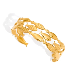 Golden cutout open bangle featuring a minimalist school of fish pattern in stainless steel