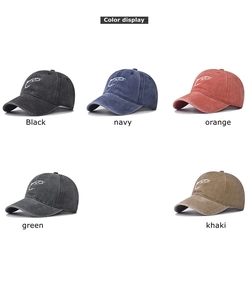 Detailed color display of washed vintage baseball caps with embroidered fish hook logo
