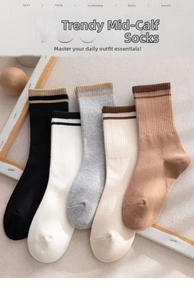 Flat lay detail of five color athletic cotton crew socks with double stripe design