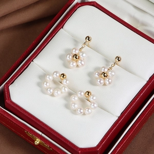 Elegant floral and hoop freshwater pearl earrings set in gold plated finish for women