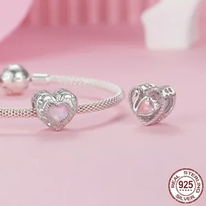 S925 silver charm pendant featuring a pink heart opal with a graceful swan design
